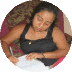 Zulma writing a letter.