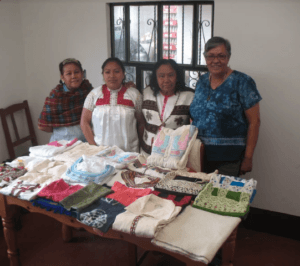 Gilda visiting with women artesans in Chiapas